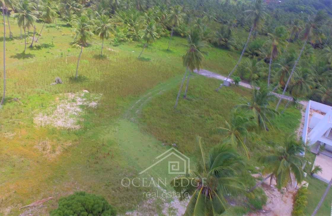 Large beachfront land in intimate area - las terrenas - real estate - drone (1)