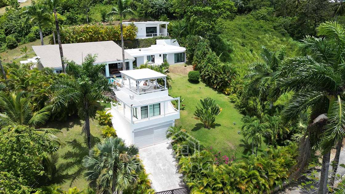 Architect-villa-in-beachfront-community-Esperanza-las-terrenas-ocean-edge-real-estate-drone