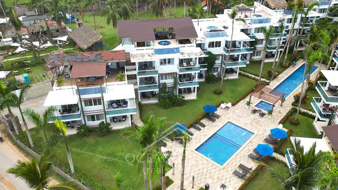 Beachfront 3-bedroom Penthouse Las Ballenas Beach Web - Las Terrenas Real Estate - OCean Edge Dominican Republic Drone 3