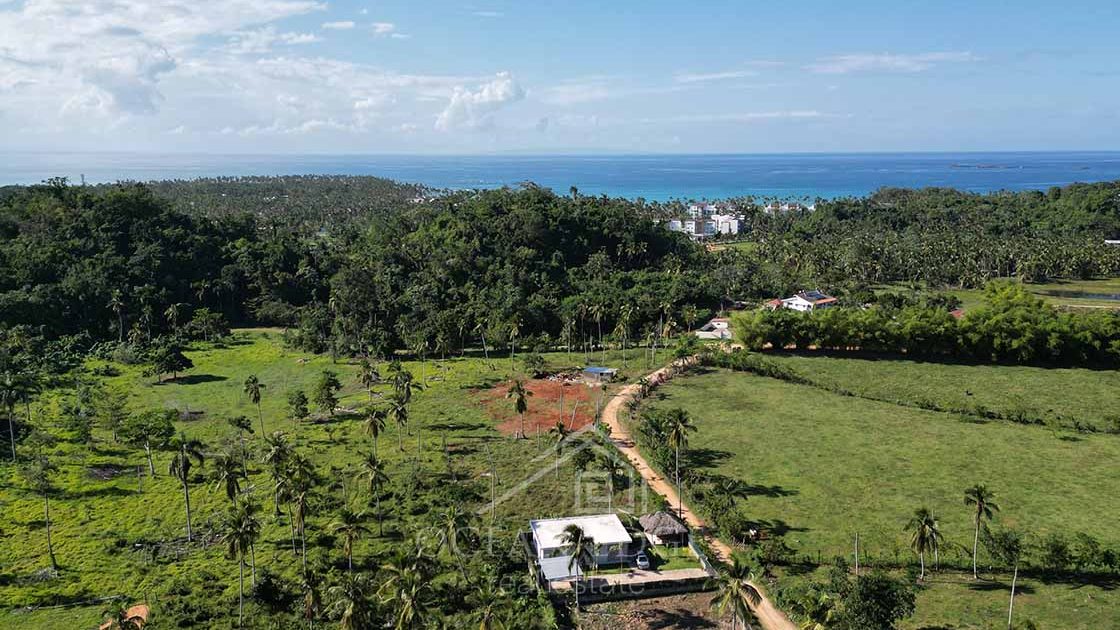 Family-caribbean-home-with-large-garden-pool-las-terrenas-ocean-edge-real-estate-drone