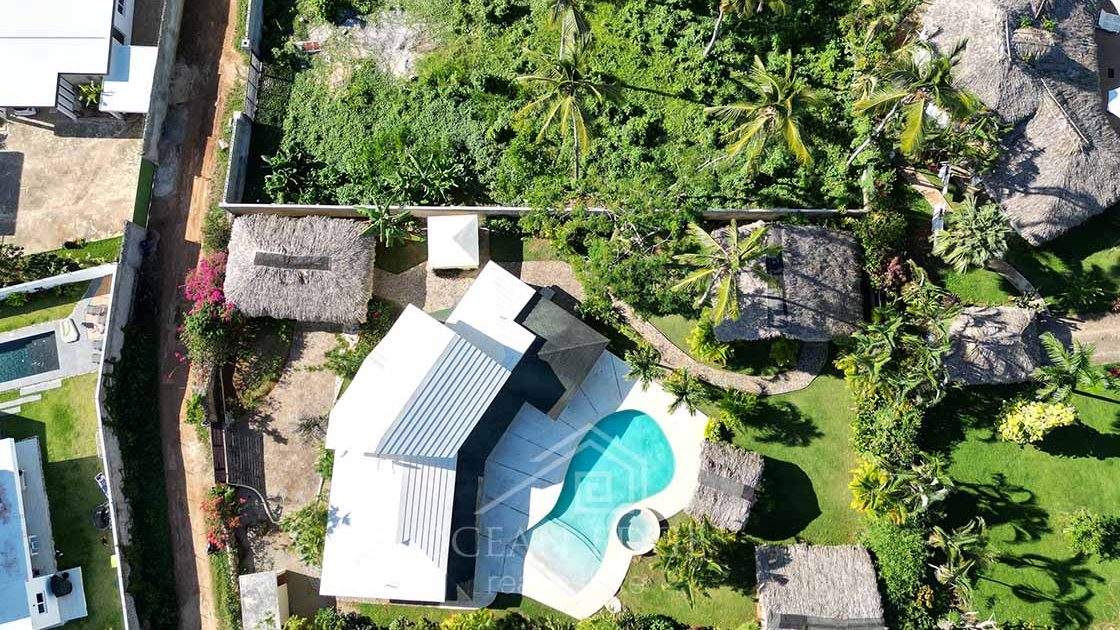 Family-caribbean-home-with-large-garden-pool-las-terrenas-ocean-edge-real-estate-drone