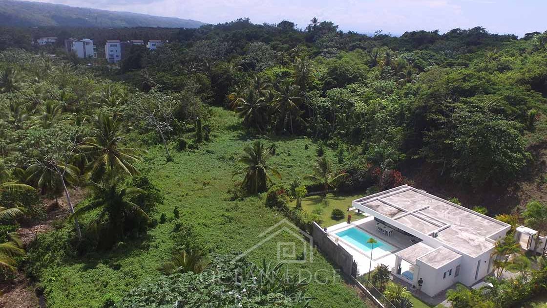 Luxury 3-bed villa with golf course in Las Ballenas-las-terrenas-ocean-edge-real-estate-drone (10)