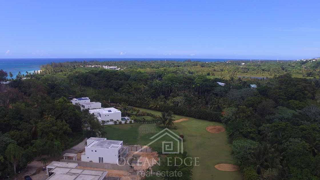 Luxury 3-bed villa with golf course in Las Ballenas-las-terrenas-ocean-edge-real-estate-drone (2)