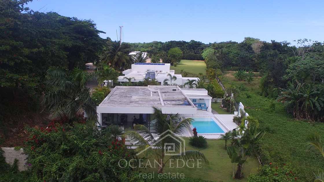 Luxury 3-bed villa with golf course in Las Ballenas-las-terrenas-ocean-edge-real-estate-drone (9)